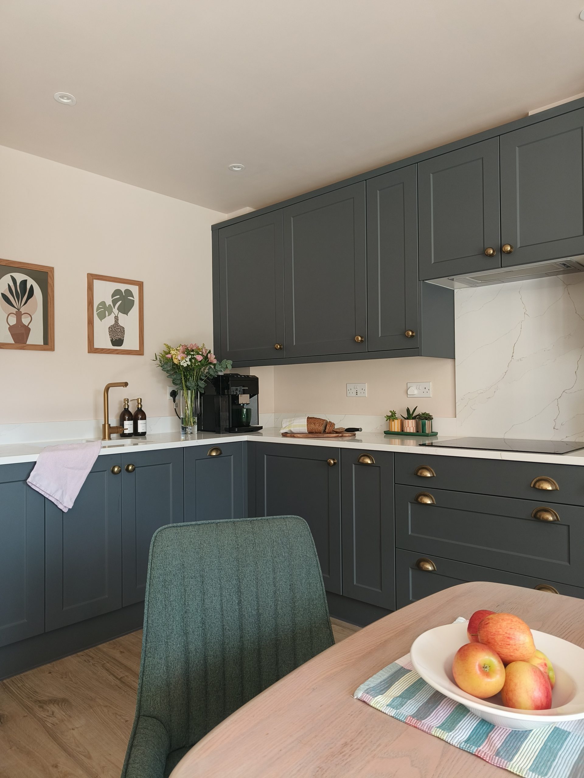 Green kitchen with green chair