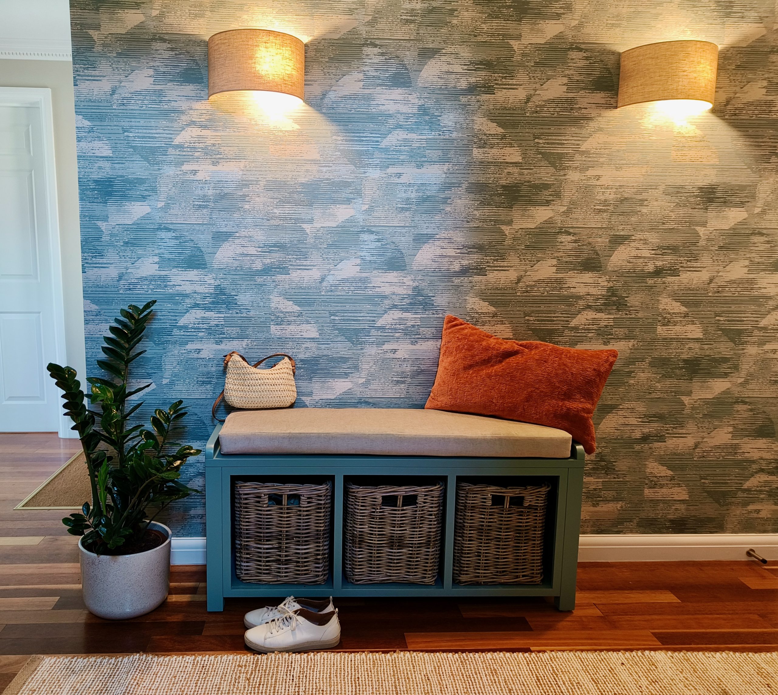 Textured blue wallpaper in calming hallway