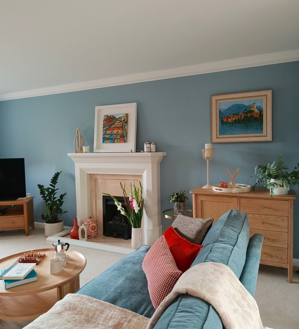 Calming modern blue living room with pale oak scandi furniture