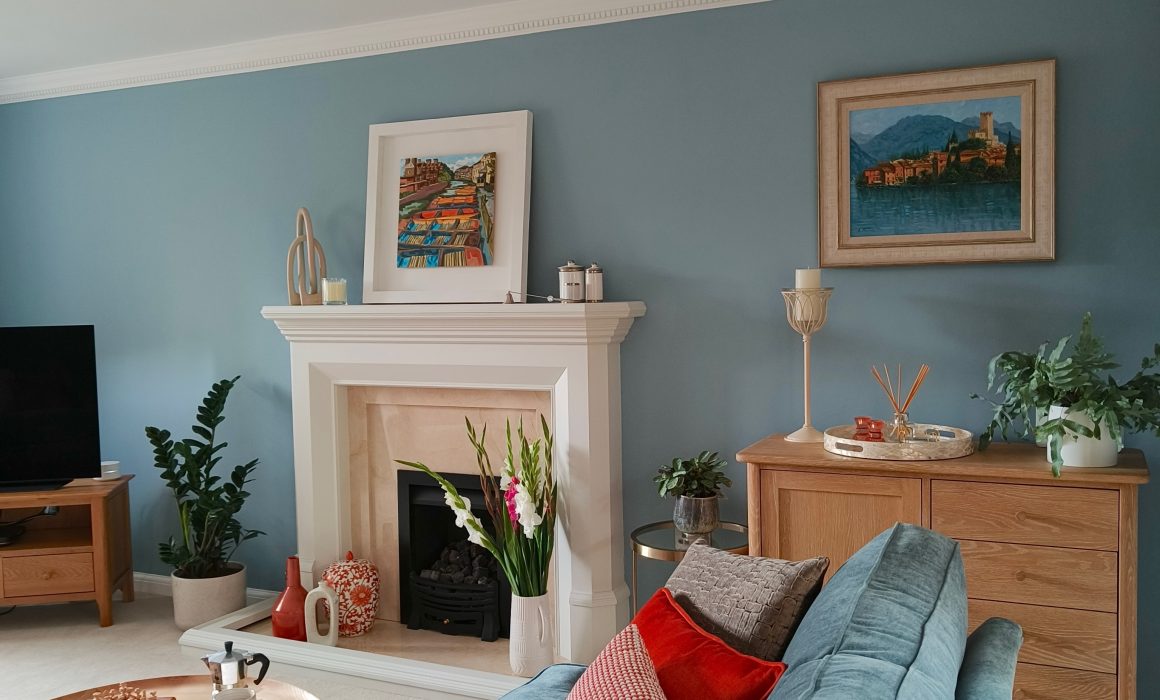 Calming modern blue living room with pale oak scandi furniture