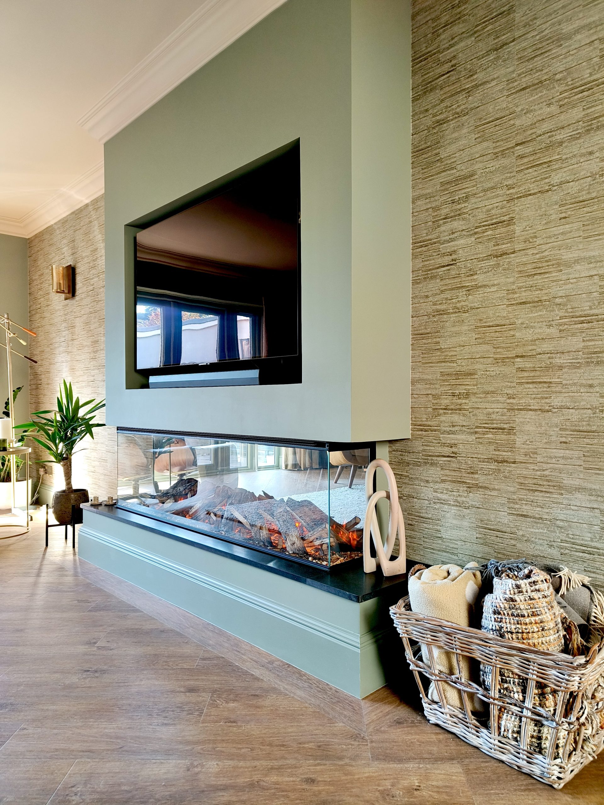 Green media unit with fire under