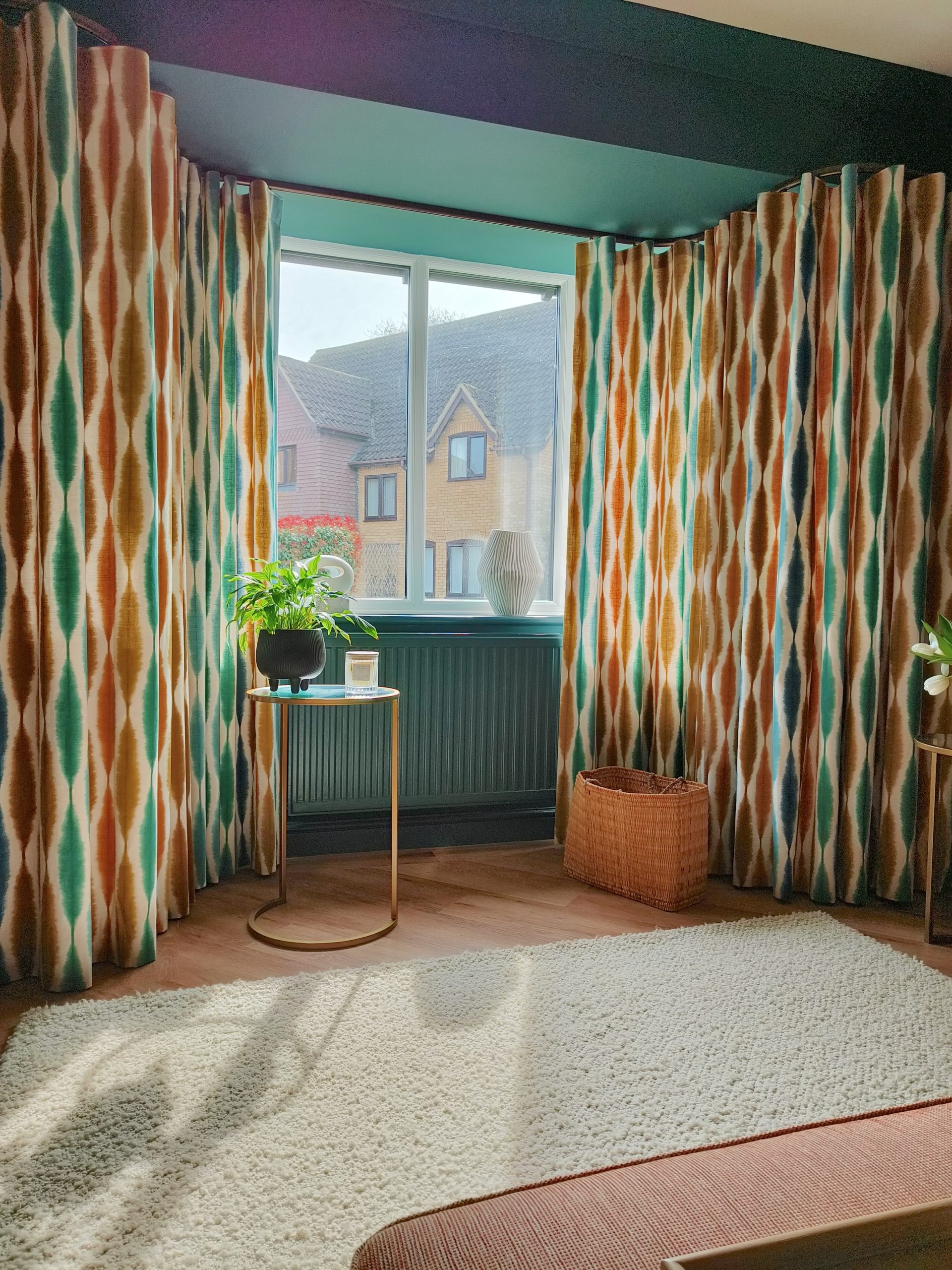 Scion wave curtains in bay window